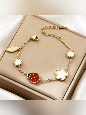 Gold-Plated Women's Clover & Disc Charm Bracelet with White and Red Accents